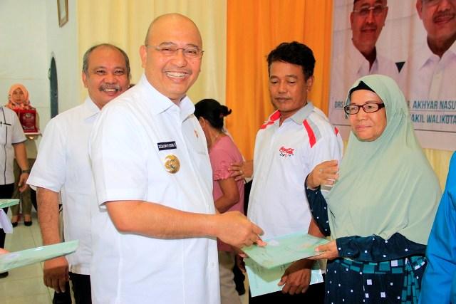 Warga Belawan Terima 1300 Sertifikat Tanah dan Potongan Pemotongan Pajak BPHTB 75 Persen