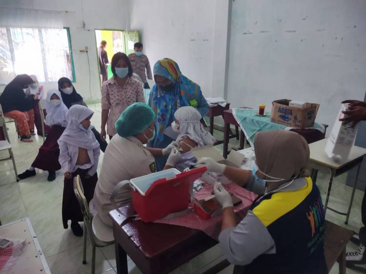 Polsek Medan Timur Ajak Orang Tua yang Anaknya Belum Divaksin untuk Mau Vaksin