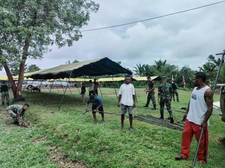 Satgas Pamtas Yonif 126/KC Bantu Persiapan Acara Pentabisan di Gereja