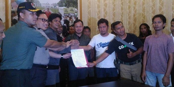 Sopir Angkot dan Ojek Online Sepakat Berdamai