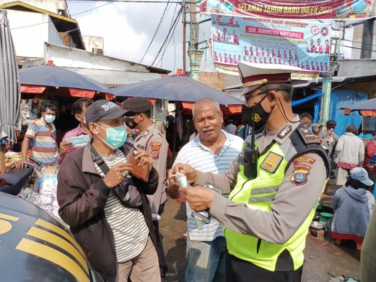 Lawan Corona, Polsek Medan Helvetia Ajak Warga Taati  Protokol Kesehatan