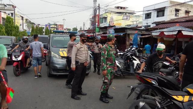 Polsek Helvetia Patroli Keliling Imbau Warga Kenakan Masker dan Terapkan Social Distancing