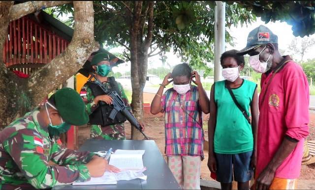 Satgas Pamtas RI-PNG Yonif 411 Edukasi Masyarakat Perbatasan Cegah Covid-19