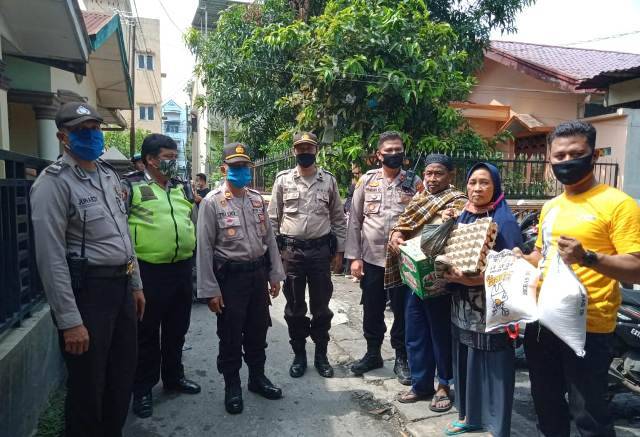 Polsek Medan Area Bantu Korban Kebakaran di Jalan Denai Gang Mulia