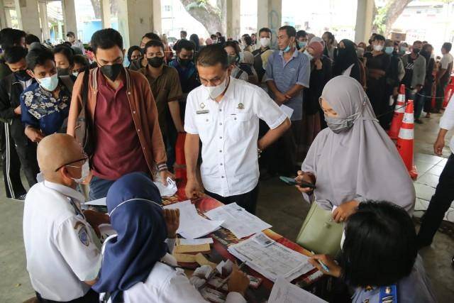  Ribuan Calon Pemudik Program Mudik Gratis Pemko Medan Mulai Mengambil Tiket Keberangkatan