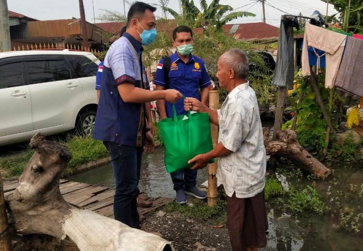 Peringati HANI, Satuan Narkoba Polresta Deli Serdang Gelar Bakti Sosial