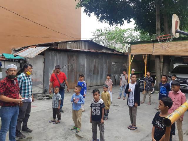Santuni Anak Yatim di Jumat Barokah, Ketua Pewarta Polrestabes Medan Tetap Patuhi Protokol Kesehatan