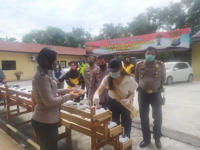Dukung Program Ketahanan Pangan, di Polsek Medan Helvetia Miss Grand Sumut 2019 Tanam Kangkung
