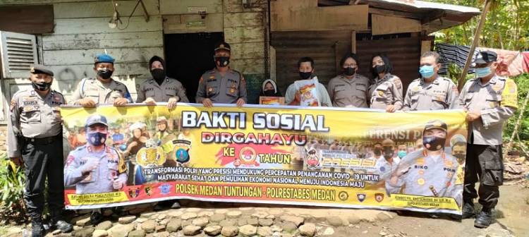 Sambut HUT Bhayangkara ke-75, Polsek Medan Tuntungan Bagikan 100 Paket Sembako kepada Warga Kurang Mampu
