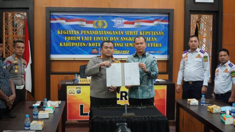 Sekda Wakili Pj Bupati Langkat Tandatangani Surat Keputusan Forum LLAJ Kabupaten/Kota Provinsi Sumut