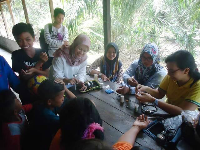 Rumah Inspirasi Sobat Berbagi Susu dan Cek Kesahatan Gratis untuk Anak-Anak di Langkat