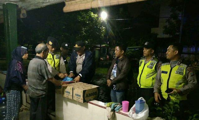 Polsek Medan Baru Bantu Korban Banjir di Padang Bulan