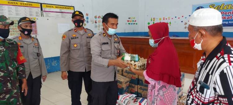 Polsek Pancur Batu Berikan Bantuan Kepada Warga yang Terkena Bencana Angin Puting Beliung