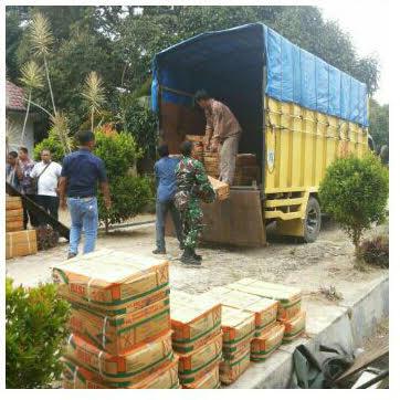 Babinsa Koramil 04/Labuhan Bilik Laksanakan Penyerahan Benih Padi