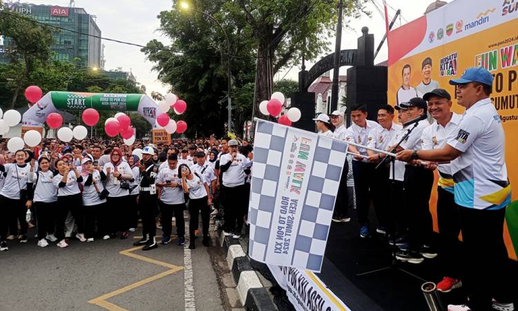 Ribuan Peserta Ikuti Jalan Santai Road to PON XXI 2024, Sekdaprov Sumut Ajak Satukan Semangat Sukseskan Event Olahraga Nasional