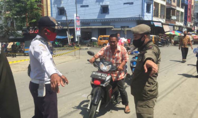 Razia Masker di Pasar Delitua, 150 Warga Tak Gunakan Masker Saat Bepergian