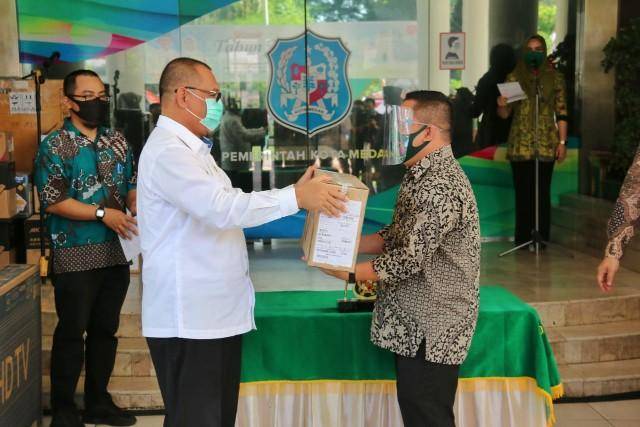 Pemko Medan Serahkan Barang Hibah ke KPU dan Bawaslu Medan, Jelang Pilkada 2020