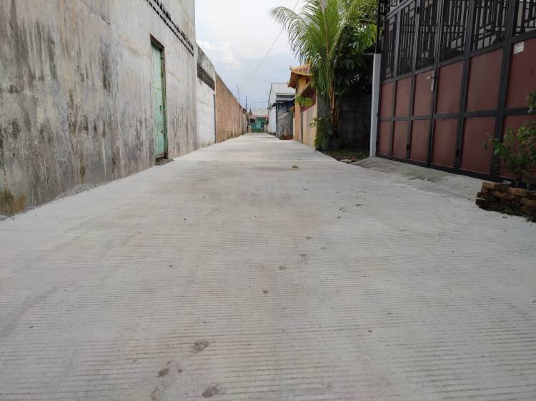Dinas SDABMBK Kota Medan Tuntaskan Pembetonan Jalan Swadaya Gang Chi Kung