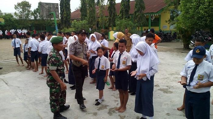 Danramil 10/SR Hadiri Kegiatan Pencanangan Pencegahan Kaki Gajah di Kampung Pon