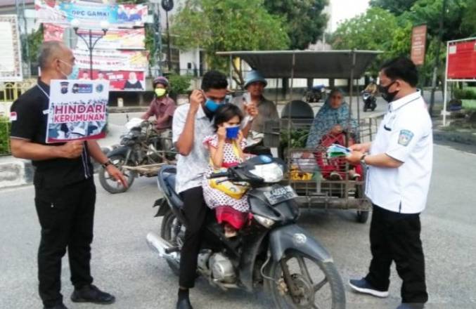 Operasi Yustisi, Satres Narkoba Polres Tanjungbalai Bagikan 350 Masker Gratis
