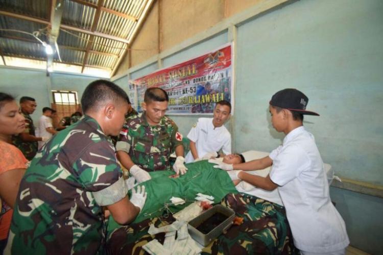 Satgas Pamtas RI Yonif 123/RW Gelar Bakti Sosial