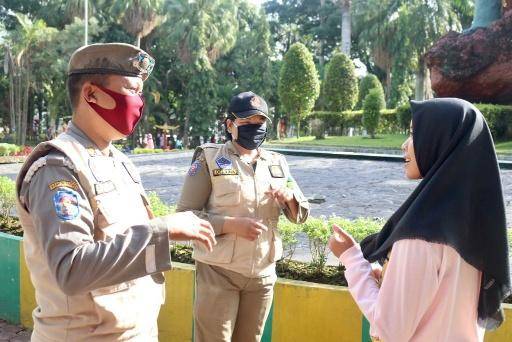 Satgas Penanganan Covid-19 Medan Sosialisasikan Prokes di Lapangan Merdeka dan Taman A Yani