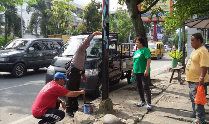 Personel Gabungan Cat Fasilitas Umum Yang Dicoret OKP di Medan