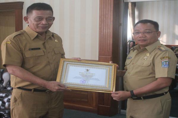  Binjai Peroleh Penghargaan Pelayanan E-KTP