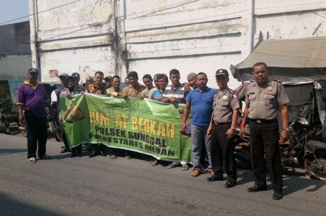 Polsek Sunggal Adakan Giat Jumat Barokah di Desa Pujimulyo