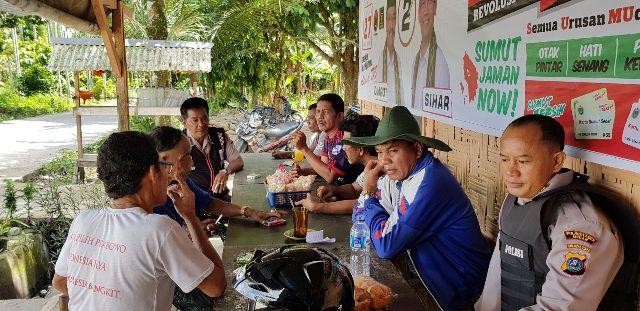 Gelar Patroli ke Desa Kwala Lau Bicik, Kapolsek Kutalimbaru Ajak Warga Sukseskan Pilkada Damai